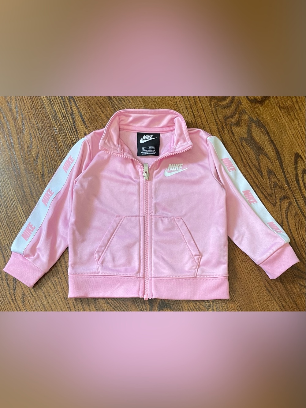 Nike Pink Track Jacket with Silver Zip Pull